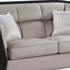 Causeuse en tissu beige avec 2 oreillers, 2 places