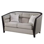 Causeuse en tissu beige avec 2 oreillers, 2 places