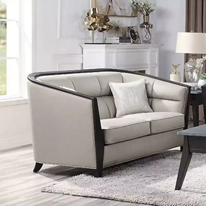 Causeuse en tissu beige avec 2 oreillers, 2 places