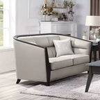 Causeuse en tissu beige avec 2 oreillers, 2 places