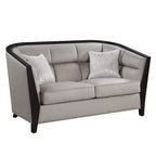 Causeuse en tissu beige avec 2 oreillers, 2 places