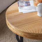 Table basse 1 personne avec plateau en pin sculpté et pieds en métal, naturel/noir, rond/irrégulier
