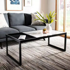 Table basse rectangulaire blanche, pieds en boucle, pour 1 personne