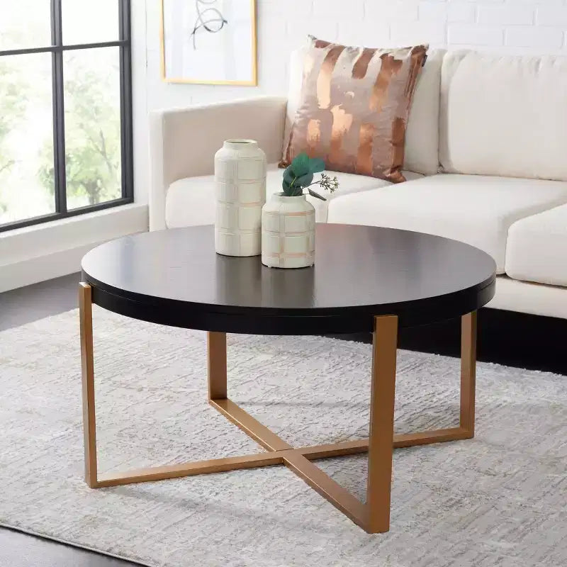 Table basse ronde avec piétement métallique entrecroisé