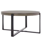 Table basse ronde avec piétement métallique entrecroisé