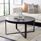 Table basse ronde avec piétement métallique entrecroisé