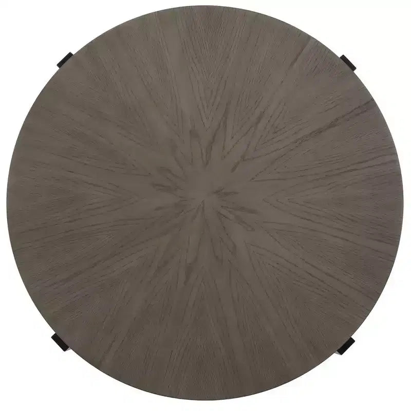 Table basse ronde avec piétement métallique entrecroisé