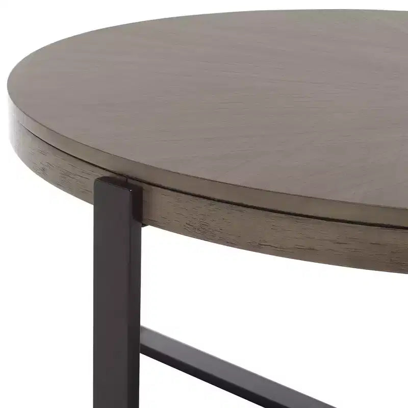 Table basse ronde avec piétement métallique entrecroisé
