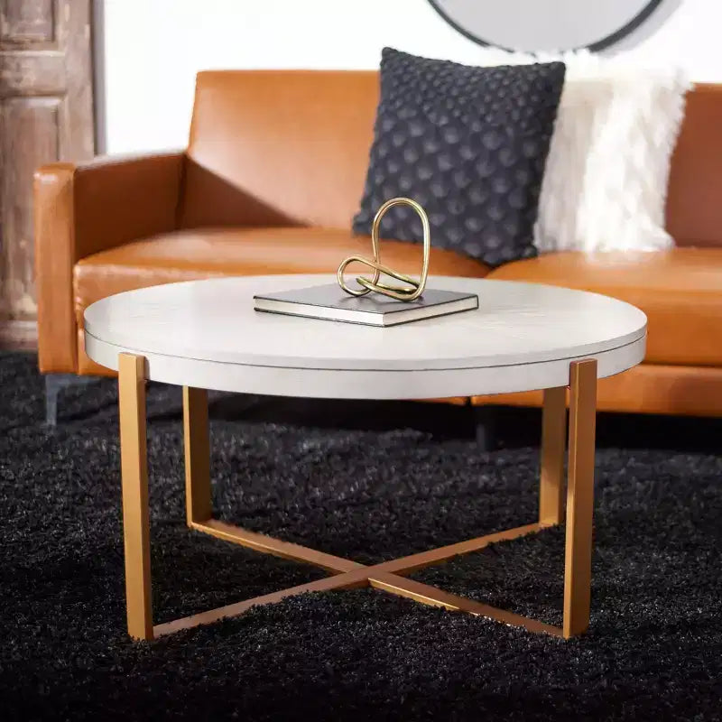 Table basse ronde avec piétement métallique entrecroisé