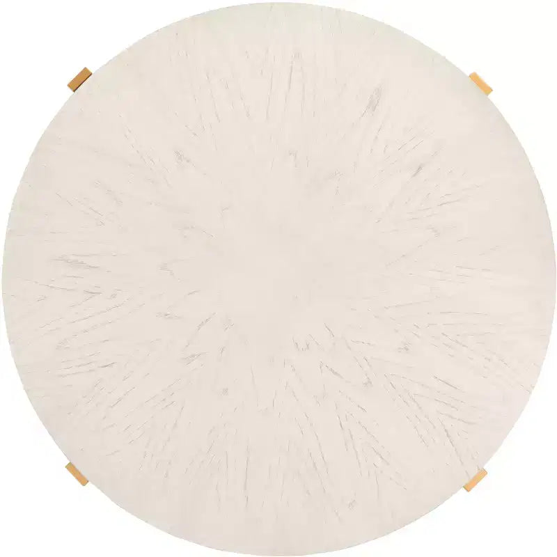 Table basse ronde avec piétement métallique entrecroisé