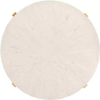 Table basse ronde avec piétement métallique entrecroisé