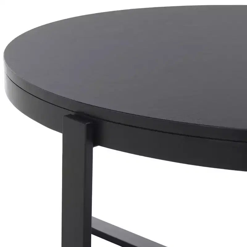 Table basse ronde avec piétement métallique entrecroisé